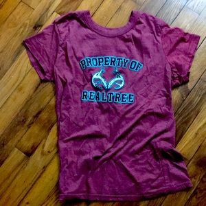 Four assorted tee shirts size small